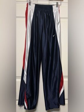 Nike Kids Navy Track Pants with Red & White Side Panels